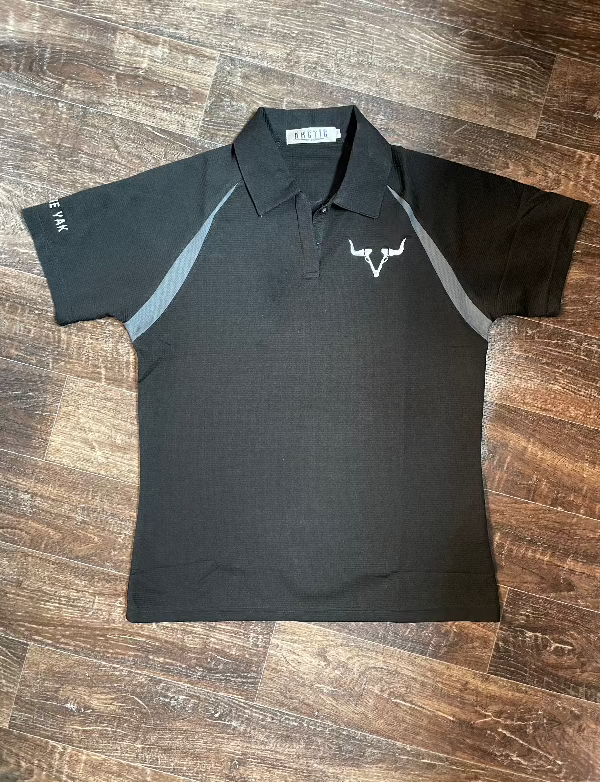 A black gold tee with gray stripes and a white yak logo embroidered on one side.